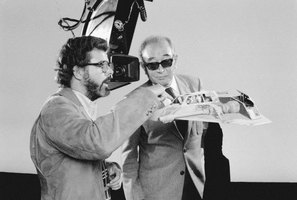 George Lucas showing legendary director Akira Kurosawa details on a Snowspeeder