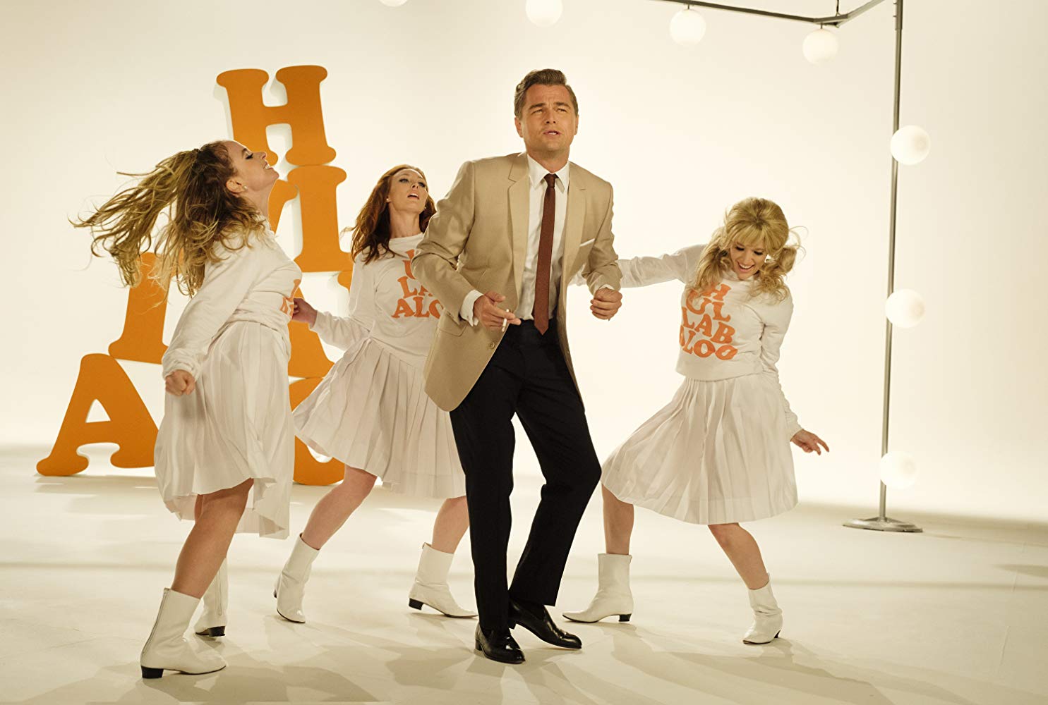Women and man dance on film set in Once Upon A Time in Hollywood